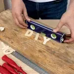 Display of DIY tools with visible instructional tips.